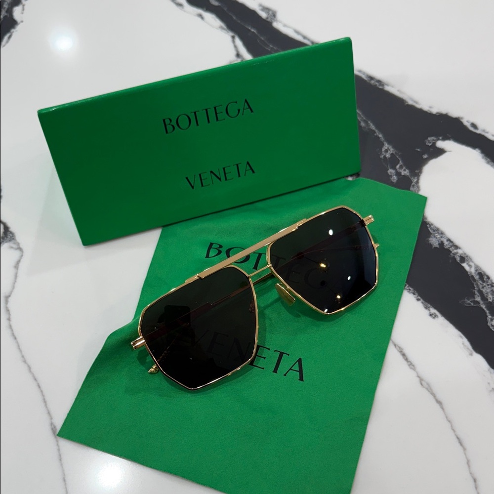 Bottega Veneta Sunglasses with Gold Frame and Black Lenses